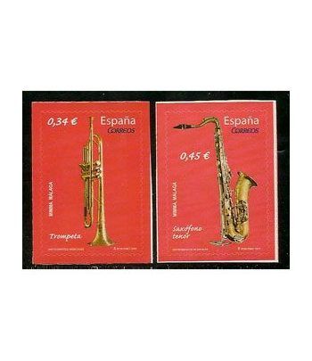 4549/50 Instrumentos musicales. Trompeta y saxófono.